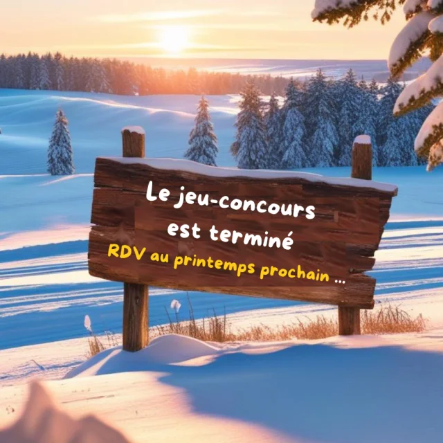 Paysage enneigé avec une pancarte indiquant : 